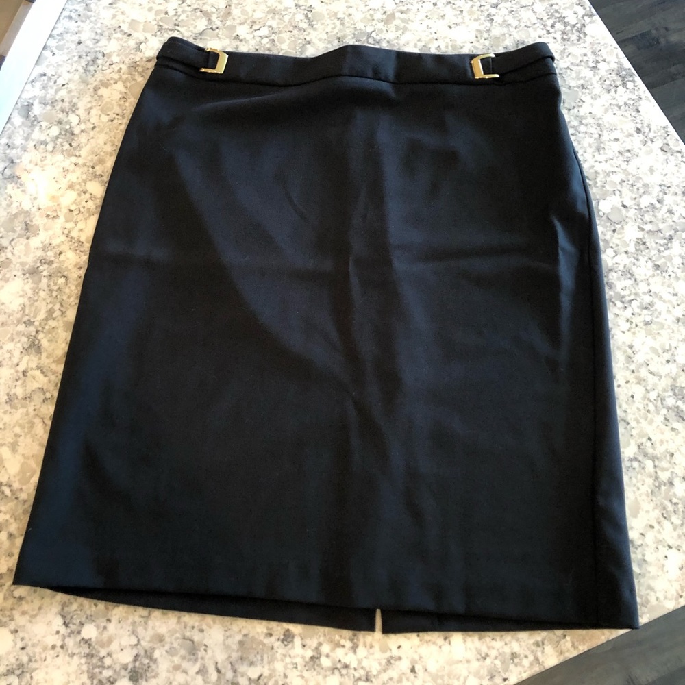 New York & Company black skirt with gold buckles